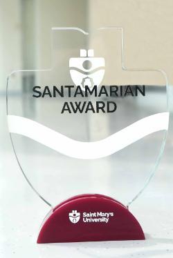 A picture of a Santamarian Award with the SMU logo.