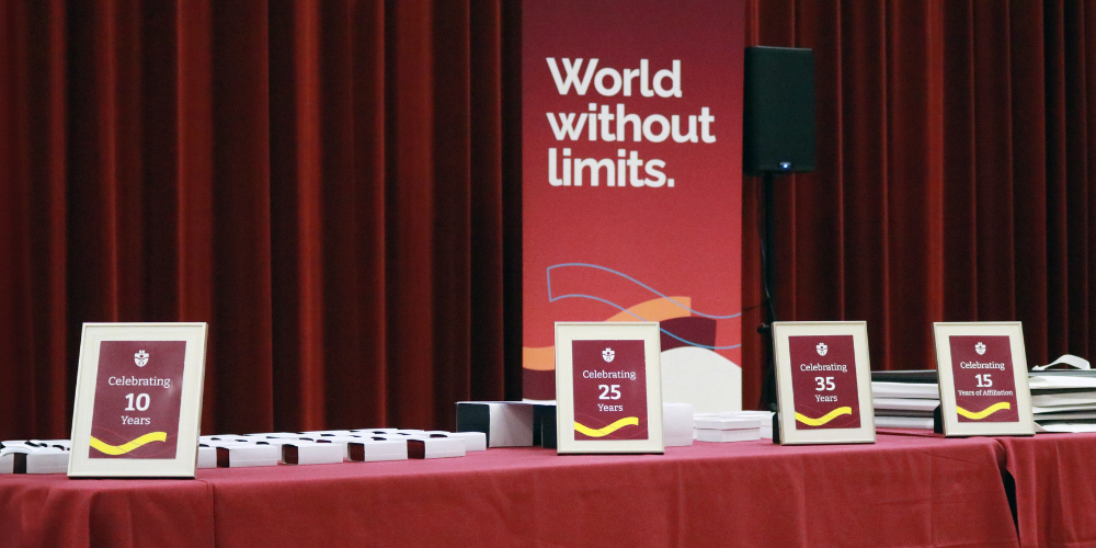 A red table displaying service awards by year